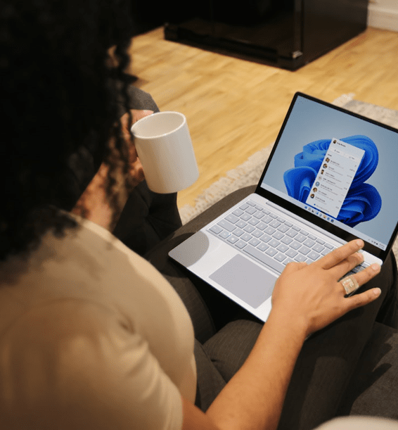 Woman on her laptop checking the first time home buyers guide.