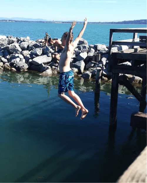 Kid jumping off a Pier in White Rock, BC